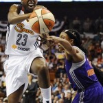 Connecticut Sun's Allison Hightower, left, is fouled by Phoenix Mercury's Alexis Hornbuckle, right, during the first half of a WNBA basketball game in Uncasville, Conn., Saturday, June 29, 2013. (AP Photo/Jessica Hill)

