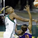 Seattle Storm's Ashley Robinson, left, knocks a shot from Phoenix Mercury's Jasmine James away in the second half of a WNBA basketball game Thursday, Aug. 1, 2013, in Seattle. The Seattle Storm won 88-79. (AP Photo/Elaine Thompson)