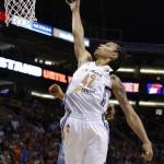Phoenix Mercury's Brittney Griner scores her first basket in the first half during a WNBA basketball game against the Chicago Sky on Monday, May 27, 2013, in Phoenix. (AP Photo/Ross D. Franklin)