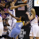 Chicago Sky's Epiphanny Prince (10) gets her shot blocked by Phoenix Mercury's Brittney Griner, left, as Mercury's Samantha Prahalis (99) looks on in the first half during a WNBA basketball game on Monday, May 27, 2013, in Phoenix. (AP Photo/Ross D. Franklin)