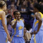 Chicago Sky's Epiphanny Prince (10) smiles as she celebrates a win over the Phoenix Mercury with teammates, including Elena Delle Donne (11) and Sylvia Fowles (34), in the second half during a WNBA basketball game on Monday, May 27, 2013, in Phoenix. The Sky defeated the Mercury 102-80. (AP Photo/Ross D. Franklin)