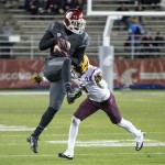 Washington State wide receiver Vince Mayle, left, catches a pass in front of Arizona State defensive back Robert Nelson, right, during the first half of an NCAA college football game on Thursday, Oct. 31, 2013, at Martin Stadium in Pullman, Wash. (AP Photo/Dean Hare)