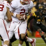 Wisconsin's Joel Stave (2) looks to hand off the ball in the first half of an NCAA college football game against Arizona State, Saturday, Sept. 14, 2013, in Phoenix. (AP Photo/Ross D. Franklin)