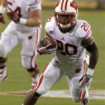 Wisconsin's James White runs with the ball against Arizona State in the first half of an NCAA college football game on Saturday, Sept. 14, 2013, in Phoenix. (AP Photo/Ross D. Franklin)