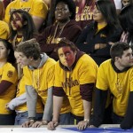 Arizona State students stand silent after a Stanford touchdown during the first half of the NCAA Pac-12 Championship football game Saturday, Dec. 7, 2013, in Tempe, Ariz. (AP Photo/Ross D. Franklin)
