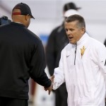 Arizona State head coach Todd Graham, right, shakes hands with Stanford head coach David Shaw prior to the Pac-12 Championship football game Saturday, Dec. 7, 2013, in Tempe, Ariz. (AP Photo/Ross D. Franklin)
