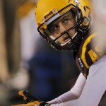 Arizona State quarterback Taylor Kelly (10) sits on the bench during the second half of the NCAA Pac-12 Championship football game against Stanford, Saturday, Dec. 7, 2013, in Tempe, Ariz. (AP Photo/Matt York)