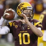 Arizona State's Taylor Kelly throws the ball against Stanford during the first half of the NCAA Pac-12 Championship football game Saturday, Dec. 7, 2013, in Tempe, Ariz. (AP Photo/Ross D. Franklin)
