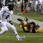 Arizona State's Alden Darby (4) breaks up a pass intended for Sacramento State's DeAndre Carter (2) during the first half in an NCAA college football game on Thursday, Sept. 5, 2013, in Tempe, Ariz. (AP Photo/Ross D. Franklin)