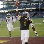 Arizona State running back Marion Grice (1) celebrates his 39-yard touchdown run against Navy during the second half of the Fight Hunger Bowl NCAA college football game in San Francisco, Saturday, Dec. 29, 2012. (AP Photo/Marcio Jose Sanchez)

