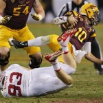 Arizona State quarterback Taylor Kelly (10) is tackled by Stanford linebacker Trent Murphy (93) during the second half of the NCAA Pac-12 Championship football game, Saturday, Dec. 7, 2013, in Tempe, Ariz. Stanford won 38-14. (AP Photo/Matt York)