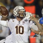 Arizona State quarterback Taylor Kelly passes during the first half an NCAA college football game against UCLA, Saturday, Nov. 23, 2013, in Pasadena, Calif. (AP Photo/Mark J. Terrill)