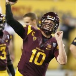 Arizona State's Taylor Kelly throws the ball before an NCAA college football game against Colorado, Saturday Oct. 12, 2013, in Tempe, Ariz. (AP Photo/Ross D. Franklin)