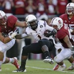 Arizona State running back Marion Grice (1) is surrounded by Stanford defenders during the first half of an NCAA college football game Saturday, Sept. 21, 2013, in Stanford, Calif. (AP Photo/Marcio Jose Sanchez)