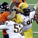 Arizona State defenders Will Sutton (90) and Carl Bradford (52) force Oregon State quarterback Cody Vaz, left, to fumble during the first half of their NCAA college football game in Corvallis, Ore., Saturday, Nov. 3, 2012. Oregon State recovered the fumble on their own two yard line and were forced to punt.(AP Photo/Don Ryan)
