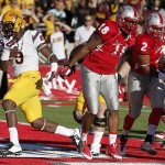 Arizona State's Kalen Ballage (9) runs in for a touchdown as he beats New Mexico's Javarie Johnson (18) and Kimmie Carson (2) to the end zone during the first half of an NCAA college football game Saturday, Sept. 6, 2014, in Albuquerque, N.M. (AP Photo/Ross D. Franklin)