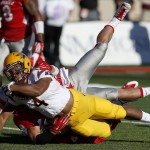 Arizona State's Demario Richard (4) is stopped just shy of the goal line as he is tackled by New Mexico's David Guthrie during the first half of an NCAA college football game Saturday, Sept. 6, 2014, in Albuquerque, N.M. (AP Photo/Ross D. Franklin)