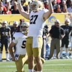 Notre Dame place kicker Kyle Brindza (27) celebrates his field goal against Arizona State during the first half of an NCAA college football game, Saturday, Nov. 8, 2014, in Tempe, Ariz. (AP Photo/Matt York)