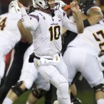 Arizona State quarterback Taylor Kelly passes against Oregon State during the first quarter of an NCAA college football game in Corvallis, Ore., Saturday, Nov. 15, 2014. (AP Photo/Troy Wayrynen)