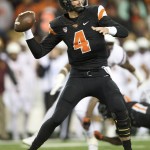 Oregon State quarterback Sean Mannion (4) passes against Arizona State during the second quarter of an NCAA college football game in Corvallis, Ore., Saturday, Nov. 15, 2014. (AP Photo/Troy Wayrynen)