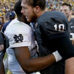 Arizona State quarterback Taylor Kelly (10) embraces Notre Dame quarterback Everett Golson after an NCAA college football game, Saturday, Nov. 8, 2014, in Tempe, Ariz. Arizona State won 55-31. (AP Photo/Matt York)