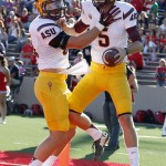 Arizona State's Zane Gonzalez (5) celebrates his 2-point conversion catch against New Mexico with teammate Kody Kohl during the first half of an NCAA college football game Saturday, Sept. 6, 2014, in Albuquerque, N.M. (AP Photo/Ross D. Franklin)
