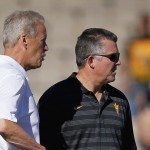 Arizona State coach Todd Graham, right, talks with New Mexico coach Bob Davie prior to an NCAA college football game Saturday, Sept. 6, 2014, in Albuquerque, N.M. (AP Photo/Ross D. Franklin)