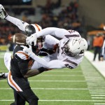 Oregon State cornerback Larry Scott breaks up a pass intended for Arizona State receiver Cameron Smith (6) during the second quarter of an NCAA college football game in Corvallis, Ore., Saturday, Nov. 15, 2014. (AP Photo/Troy Wayrynen)