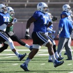 Duke's Laken Tomlinson, center, and other players warm up during NCAA college football practice, Wednesday, Dec. 24, 2014, in El Paso, Texas. Duke is scheduled to play Arizona State in the Sun Bowl on Saturday. (AP Photo/The El Paso Times, Victor Calzada)