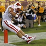Wisconsin's Jacob Pedersen keeps his feet in as he makes a touchdown catch against Arizona State in the first half of an NCAA college football game on Saturday, Sept. 14, 2013, in Phoenix. (AP Photo/Ross D. Franklin)