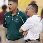 Arizona State head coach Todd Graham, right, talks with Sacramento State head coach Marshall Sperbeck before an NCAA college football game on Thursday, Sept. 5, 2013, in Tempe, Ariz. (AP Photo/Ross D. Franklin)