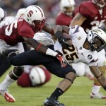 Arizona State's Deantre Lewis, right, is brought down by Stanford cornerback Alex Carter during the second half of an NCAA college football game Saturday, Sept. 21, 2013, in Stanford, Calif. Stanford won 42-28. (AP Photo/Marcio Jose Sanchez)
