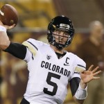 Colorado's Connor Wood throws the ball before an NCAA college football game against Arizona State, Saturday Oct. 12, 2013, in Tempe, Ariz. (AP Photo/Ross D. Franklin)