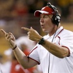 Wisconsin head coach Gary Andersen gives instructions to his players on the field in the first half of an NCAA college football game against Arizona State on Saturday, Sept. 14, 2013, in Phoenix. (AP Photo/Ross D. Franklin)