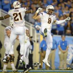 Arizona State running back D.J. Foster, right, celebrates his touchdown with wide receiver Jaelen Strong during the first half an NCAA college football game against UCLA, Saturday, Nov. 23, 2013, in Pasadena, Calif. (AP Photo/Mark J. Terrill)