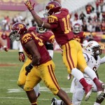 Southern California defensive end Leonard Williams (94) celebrates making an interception with teammate linebacker Hayes Pullard (10) during the second half of an NCAA college football game against Arizona State, Saturday, Nov. 10, 2012, in Los Angeles. Southern California won 38-17. (AP Photo/Bret Hartman)