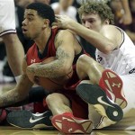Texas Tech's Josh Gray, left, and Kader Tapsoba, back, battle for the loose ball with Arizona State's Kenny Martin during their NCAA college basketball game in Lubbock, Texas, Saturday, Dec. 22, 2012.