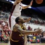 Arizona State guard Jermaine Marshall, bottom, goes to the basket but is blocked by Stanford center Stefan Nastic, top, during the first half of their NCAA college basketball game Saturday, Feb. 1, 2014, in Stanford, Calif. (AP Photo/Eric Risberg)