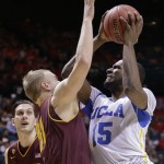 UCLA's Shabazz Muhammad (15) puts up a shot against Arizona State's Jonathan Gilling (31) in the first half during a Pac-12 tournament NCAA college basketball game on Thursday, March 14, 2013, in Las Vegas. UCLA won 80-75. (AP Photo/Julie Jacobson)