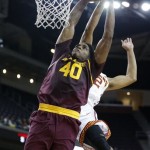 Arizona State's Shaquielle McKissic attempts a dunk but misses as he is fouled by Southern California's Julian Jacobs, rear, during the first half of an NCAA college basketball game, Thursday, Jan. 9, 2014, in Los Angeles. (AP Photo/Danny Moloshok)
