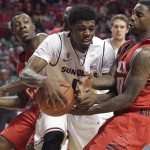 Arizona State's Carrick Felix works against Texas Tech's Jamal Williams, left, and Daylen Robinson, right, during an NCAA college basketball game in Lubbock, Texas, Saturday, Dec. 22, 2012. (AP Photo/Lubbock Avalanche-Journal, Zach Long) 