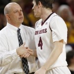 Arizona State coach Herb Sendek, left, shakes hands with Bo Barnes late in the second half of an NCAA college basketball game against Colorado on Saturday, Jan. 25, 2014, in Tempe, Ariz. Arizona State defeated Colorado 72-51. (AP Photo/Ross D. Franklin)