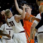Oregon State's Angus Brandt (12) and Arizona State's Brandan Kearney (31) battle for possession during the first half of an NCAA college basketball game, Thursday, Feb. 6, 2014, in Tempe, Ariz. (AP Photo/Matt York)