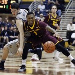 Arizona State's Jahii Carson, right, dribbles toward the basket as California's Sam Singer defends during the second half of an NCAA college basketball game, Wednesday, Jan. 29, 2014 in Berkeley, Calif. (AP Photo/George Nikitin)