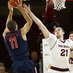 Arizona's Aaron Gordon (11) shoots over Arizona State's Eric Jacobsen (21) during the first half of an NCAA college basketball game on Friday, Feb. 14, 2014, in Tempe, Ariz. (AP Photo/Ross D. Franklin)