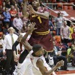 Arizona State's Jahii Carson (1) fouls Utah's Jarred DuBois (5) on the way to the basket in the second half during an NCAA college basketball game Wednesday, Feb. 13, 2013, in Salt Lake City. Utah defeated Arizona State 60-55. (AP Photo/Rick Bowmer)