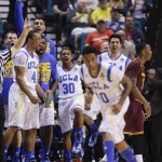 The UCLA bench reacts after a 3-point basket by Larry Drew II (10) against Arizona State in the closing minutes of a Pac-12 tournament NCAA college basketball game, Thursday, March 14, 2013, in Las Vegas. UCLA won 80-75. (AP Photo/Julie Jacobson)