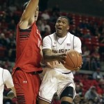 Arizona State's Jahii Carson drives against Texas Tech's Dejan Kravic during their NCAA college basketball game in Lubbock, Texas, Saturday, Dec. 22, 2012. (AP Photo/Lubbock Avalanche-Journal, Zach Long)