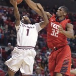 Arizona State's Jahii Carson has his shot blocked by Texas Tech's Jordan Tolbert during an NCAA college basketball game in Lubbock, Texas, Saturday, Dec. 22, 2012. (AP Photo/Lubbock Avalanche-Journal, Zach Long) 