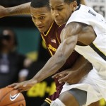 Arizona State's Jahii Carson (left) has the ball stolen by Oregon's Dominic Artis during the second half of an NCAA college basketball game in Eugene, Ore. Sunday Jan. 13, 2013. (AP Photo/Chris Pietsch)